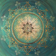 an artistic painting with blue and gold colors on the ceiling in a circular pattern,