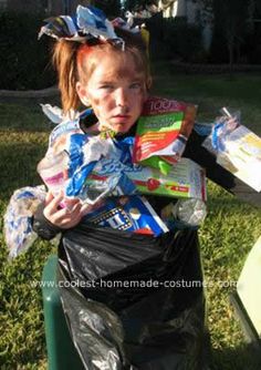 Homemade Bag of Trash Child Halloween Costume: My 8-year-old daughter was playing in the rain one day, and came out of the garage wrapped in large black trash bags. I thought to myself “what a great Garbage Bag Halloween Costume, Bag Of Trash Costume, Garbage Bag Costume Ideas, Trash Bag Costume, Trash Costume, Trash Bag Dress, Playing In The Rain, Costumes 2024, Homemade Bags