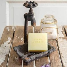 a soap bar sitting on top of a wooden table