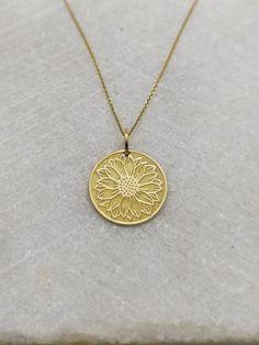 "14K Real Solid Gold Necklace, Hallmarked on the back of your pendant for certification! ▪️ A beautiful and clean engraved Sun Flower pendant made out of 14K Solid Real Gold. Available only in yellow gold! Pendant Thickness: 0.50mm Jump Ring inner diameter: 4mm Dimensions - Small - 13x13mm / 0.51 x 0.51 inches Medium - 14x14mm / 0.55 x 0.55 inches Big - 15x15mm / 0.59 x 0.59 inches Necklace Length - You can choose your chain length from 35CM to 50CM. The pendant is available alone without a chai Yellow Gold Plated Flower Jewelry, Gold Plated Yellow Gold Flower Jewelry, Yellow Gold Jewelry With Sunflower Design As Gift, Yellow Gold Pendant Jewelry With Flower Charm, Gold Flower-shaped Jewelry For Anniversary, Yellow Gold Flower-shaped Necklace For Anniversary, Gold Flower Shaped Jewelry For Anniversary, Gold Flower Jewelry For Anniversary, Gold Engraved Flower-shaped Necklace