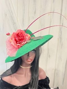 Ready to ship today from Tennessee, USA. I ship quickly and package safely in boxes.  See more  distinctive hat choices at my Etsy shop at https://www.etsy.com/shop/equineelan   This hat is a vibrant emerald green color with pink accents. My lighting cast a yellow tone to the photos giving the flower a coral looking color. The flower is light and dark pink. The close up photo shows the true color. The hat shape is a "Hepburn" shape hat with a moderate wide brim. The material is a sinamay weave t Adjustable Green Costume Hats With Short Brim, Adjustable Brimmed Green Mini Hats, Adjustable Green Brimmed Mini Hats, Pink Wide Brim Hat For Gift, Pink Wide Brim Hat As A Gift, Pink Wide Brim Hat As Gift, Adjustable Green Top Hat, Green Flat Brim Hat For Kentucky Derby, Pink Mini Hats With Flat Brim For Party