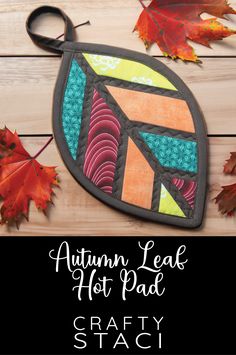 an autumn leaf hot pad with the words, crafty staci on it