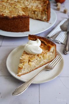 a piece of pie on a plate with a fork