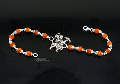 925 sterling silver handmade custom design 'Lord Hanuman' Bracelet Or Rakhi with solid beads chain, this is special design bracelet rakhi for Rakshabandhan Festival in India, best wishes gift for your brother and sister's , Metal-925 sterling silver. Item type-Rakhi Bracelet. Length-8 inches.(length will be customized if buyer request) Weight-7.290 grams. Aum size-2.1 cm diameter. beads size-5 mm approx. Stamped-925. Make excellent gifting and collectible pieces(gift for birthday, wedding, anniv Bracelet Rakhi, Gold Bridal Jewellery Sets, Design Bracelet, Beads Chain, Lord Hanuman, Jewellery Sets, Precious Jewels, Bridal Jewellery, Braided Bracelets