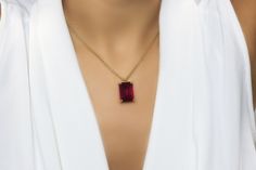 "Celebrate vibrance and sophistication with this Garnet gemstone necklace. A birthstone jewelry to add to your collection or give as a timeless gift necklace for your wife, girlfriend or a loved one. This piece is simple yet utterly striking and bold. ♥ Gemstone Type - Garnet (Lab Created) ♥ Gemstone Size - 13x18mm ♥ Gemstone Cut - Rectangle - More options available in the drop down menu ♥ Metal Type (Main Photo) - 14k Gold Filled - More options available in the drop down menu ♥ Length (Model Ph Garnet Jewelry Necklace, January Birthstone Necklace, Pink Garnet, Large Pendant Necklace, Peridot Necklace, Fancy Gifts, Garnet Pendant, Red Necklace, Garnet Necklace