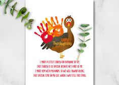 a thanksgiving card with a turkey and hand prints