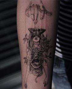 a woman's arm with a tattoo on it