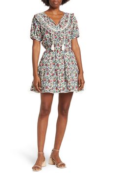 A charming short sleeve min dress with a drawstring keyhole and a tiered flounce embedded in a floral print. 33'' length (size S) Embroidery trim Puff sleeves Elastic waist Shell and lining: 100% Cotton Hand wash cold Imported Model stats: 5'10" height, 32" bust, 25" waist, 36" hip. Model is wearing size S S Embroidery, Puff Sleeves, Nordstrom Rack, Puff Sleeve, Casual Dress, Elastic Waist, Floral Print, Floral Prints, Hand Wash