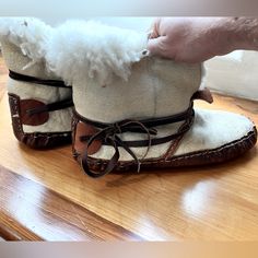 Authentic Sheepskin Moccasins Handmade And Purchased At A Native American Pow Wow. These Are A Size 9.5-10 Mens. The Are Made Entirely Of Sheepskin And Leather With Leather Draw String To Tighten. Originally Purchased For 300$ Cream Slip-on Moccasins With Rubber Sole, Cream Slip-on Moccasins With Leather Sole, Beige Leather Sole Moccasins Closed Toe, Beige Closed Toe Moccasins With Leather Sole, Cream Leather Slip-on Moccasins, Beige Leather Slippers With Leather Sole, Cream Leather Moccasins With Rubber Sole, Winter Leather Moccasins With Rubber Sole, Cream Moccasins With Rubber Sole And Round Toe