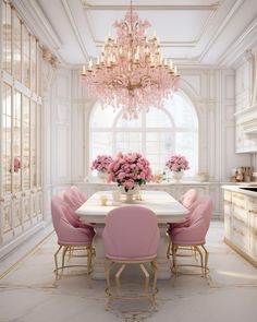 an elegant dining room with pink chairs and chandelier