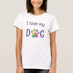 a woman wearing a t - shirt that says i love my dog