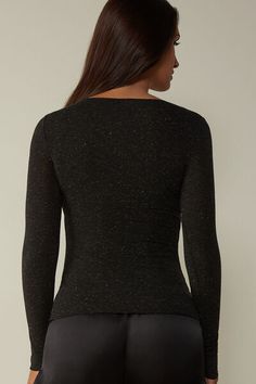 Long sleeve bateau neck top in soft modal ultralight with cashmere and lamé thread. Elegant Crew Neck Top For Layering, Winter Seamless Crew Neck Top, Elegant Stretch Knit Top With Crew Neck, Elegant Seamless Tops For Winter, Elegant Seamless Crew Neck Tops, Elegant Fine Knit Tops For Night Out, Elegant Seamless Winter Tops, Elegant Fitted Long Sleeve Top With Crew Neck, Elegant Fitted Crew Neck Long Sleeve Top