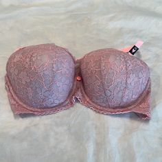 So Pretty, This Dream Angels Lined Demi Bra In Sweet Lavender With Peach Accents. All Over Lace, Including Sides. Peach Scalloped Edging, Adjustable Peach Straps. Back Close. Center Rose. Underwire. Approx. Cup Padding Is 3/8" Throughout. Designed For Uplifting And Cleavage. New, Never Worn. Size 38c. Pink Strapless Bra With Padded Cups, Victoria's Secret Feminine Purple Bra, Feminine Purple Underwire Bra, Feminine Purple Bra, Victoria's Secret Purple Bra For Spring, Purple Lace Push-up Bra, Feminine Fitted Purple Bra, Fitted Feminine Purple Bra, Spring Purple Lace Bra