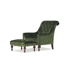 an upholstered green chair and footstool