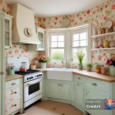 a white stove top oven sitting inside of a kitchen next to a sink and window