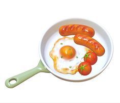 two hot dogs and an egg in a pan with tomatoes on the side next to each other