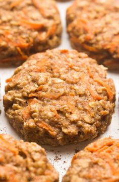 carrot and oatmeal breakfast cookies on a baking sheet ready to be eaten