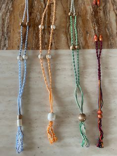 Macrame crystal necklaces inspired by the four nations from Avatar: The Last Airbender! Air, water, earth, & fire! Spiritual Macrame Beaded Necklaces, Adjustable Crystal Necklaces For Festival, Adjustable Macrame Beaded Necklaces For The Beach, Bohemian Crystal Necklace With Adjustable Waxed Cord, Bohemian Macramé Necklace With Waxed Cord, Bohemian Macrame Necklace With Waxed Cord, Hippie Macrame Necklaces For Beach, Hippie Macrame Beach Necklaces, Hippie Macrame Necklace For Beach