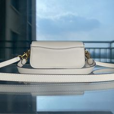 new Coach baguette patent leather crossbody bag  women's bag STUDIO BAGUETTE,

size: 20*10*7 High-end White Crossbody Flap Bag, Luxury White Crossbody Baguette Bag, Luxury White Baguette Crossbody Bag, Luxury White Rectangular Baguette Bag, White Crossbody Baguette Bag For Formal Occasions, White Formal Crossbody Baguette Bag, Formal White Crossbody Baguette Bag, White Rectangular Baguette Bag With Gold-tone Hardware, Music Bag