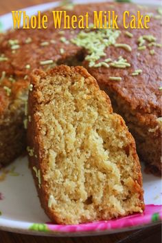 two pieces of cake sitting on top of a white plate