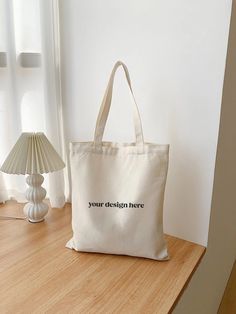 "Tote Bag Mockup, Canvas Tote Bag Mockup, Printify Tote Bag, Print on Demand Mockup, Model Mock up, Aesthetic Tote Bag, Gift Bag Mockup ---- 𝗠𝗢𝗖𝗞𝗨𝗣 𝗜𝗡𝗙𝗢𝗥𝗠𝗔𝗧𝗜𝗢𝗡 Can be used for Port Authority B150 Bags and Liberty Bags OAD113   𝗧𝗵𝗲 𝗱𝗼𝘄𝗻𝗹𝗼𝗮𝗱 𝗶𝗻𝗰𝗹𝘂𝗱𝗲𝘀:  - 1 High Resolution JPG - 1 Photoshop File      - How to use in Photoshop          - open file         - double tap on \"place your design here\" on the far right side of page in the layers tab         - place your design & save it         - go back to original design tab and see your beautiful mockup with your custom design :)" White Tote Bag For Personal Use, White Casual Bags For Personal Use, Everyday White Bags With Branding, Casual White Bags For Personal Use, White Shoulder Bag With Large Capacity For Personal Use, Everyday White Branded Bag, Minimalist White Bag For Daily Use, Large Capacity Tote Bag For Personal Use, Casual Tote Bag For Personal Use