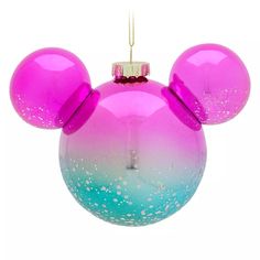 a pink and blue mickey mouse ornament hanging from a string