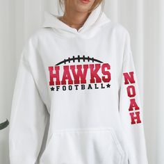 Customize this Football spirit wear sweatshirts or hoodie with your mascot's name, team colors, then on the sleeve is the player's first name, and then finally on the back is the last name and player number. This design is a great gift for football girlfriends, football moms, dads and the whole family. To add a name (and or number) to the back of a shirt, add lounge pants, expedite processing, add overnight shipping, and any other miscellaneous items- please follow this link: https://www.etsy.com/shop/KASPDesign?ref=seller-platform-mcnav§ion_id=27547745 Listing is for one garment. To order... 1. Select the style and size you would like, then the color for the garment. 2. Fill out the personalization section. 3. Then add to cart. To order more than one item of the same style, size, and colo Football Moms, Football Girlfriend, Football Spirit, Player One, Miscellaneous Items, Spirit Wear, Football Mom, Lounge Pants, Team Colors