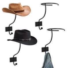 three hats are hanging on the wall and one has a coat rack with two hooks