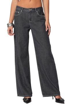 Polished pinstripes add a refined element to traditionally casual jeans cut with baggy wide legs in a Y2K-inspired low-rise silhouette. Zip fly with button closure Five-pocket style 100% cotton Machine wash, line dry Imported Trendy Pinstripe Wide Leg Bottoms, Trendy Pinstripe Wide Leg Pants, Casual Pinstripe Wide Leg Bottoms, Casual Pinstripe Wide-leg Bottoms, Pinstripe Straight Leg Bottoms For Fall, Fall Pinstripe Wide Leg Bottoms, Pinstripe Wide Leg Bottoms With Relaxed Fit, Pinstripe Wide-leg Bottoms With Relaxed Fit, Striped Relaxed Fit Straight Leg Jeans