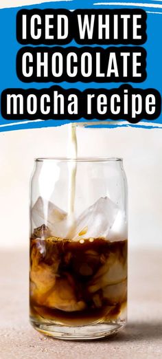 iced white chocolate mocha recipe in a glass jar with ice and milk being poured into it