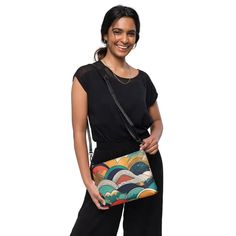 Retro Abstract Crossbody Bag: Stylish & Durable! Elevate your style with our Retro Abstract Crossbody Bag, featuring a vibrant colored abstract pattern that exudes retro charm. Crafted from premium faux leather and lined with 100% polyester, this bag is not only stylish but also built to last. The dark gray hardware adds a touch of sophistication, while the zip-top closure and multiple inside pockets ensure that your essentials stay secure and organized. What makes this crossbody bag truly unique is its versatility. With removable wrist and shoulder straps, you can effortlessly transition from a daytime accessory to a chic evening bag. The adjustable strap drop length of 14"-27" guarantees a comfortable fit for all body types. Measuring 11" x 8" x 1.5", this bag offers the ideal size for y Casual Crossbody Clutch, Casual Handheld Clutch For Travel, Casual Multicolor Rectangular Clutch, Casual Handheld Travel Clutch, Casual Clutch With Adjustable Strap For Travel, Casual Travel Clutch With Adjustable Strap, Casual Multicolor Pouch For Everyday Use, Trendy Multicolor Travel Clutch, Casual Clutch With Removable Pouch