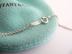 Overview:Offered for sale is a fantastic, very elegant, and super pretty Tiffany and Co. Silver Trefoil Key & 18K Gold Heart Key Combination Necklace. Wonderful necklace that fits a lifestyle on the go -- the necklace can be worn to almost any occasion! Hanging from its beautiful and very versatile 18.45 inch Tiffany & Co. sterling silver curb link chain are two gorgeous and classic Tiffany Keys! A Trefoil Key AND an 18K Gold Heart key - awesome and versatile statement pieces! You can we Tiffany Key, Heart And Key, Tiffany And Co, Tiffany Heart, Heart Charm Bracelet, Heart Of Gold, Tiffany & Co., Alex And Ani Charm Bracelet, 18k Gold