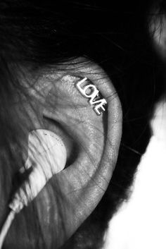 an ear with the word love written on it