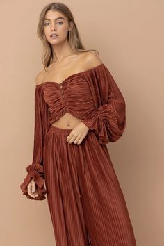 Micro accordion pleated crop top and palazzo pant set. Gorgeous rust color with fully functioning buttons. Runs small. Size up 1 to 2 sizes. Non stretch. 100% polyester Pleated Crop Top, Palazzo Pant, Rust Color, Pant Set, Palazzo Pants, Pants Set, Rust, Button Up, Crop Top