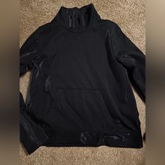 Nwot Under Armour Cowl Pullover. Metallic Black Color- Be Great To Dress Up Or Down. Medium Black Turtleneck Sweatshirt For Streetwear, Black Funnel Neck Top For Streetwear, Black Sporty Funnel Neck Tops, Black Sporty Top With Funnel Neck, Sporty Black Funnel Neck Top, Sporty Black Turtleneck Top, Black Funnel Neck Sweatshirt For Fall, Sporty Black Top With Funnel Neck, Black Stretch Sweatshirt