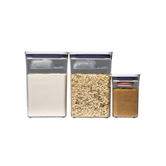 three glass containers with different types of food in them on a white background, one is empty and the other has no lid