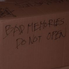 a box with graffiti written on it and the words bad memories don't open