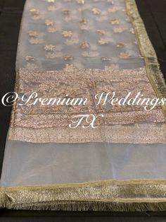 NO REFUNDS - NO EXCHANGE - NO RETURNS - CANCEL ORDER WITHIN 12 HOURS OF PURCHASE * Material:        * Organza fabric       * Gold Banarsi Border & Pattern       * Gold Fringe/Frill Border * Perfect for any occasion! * Add a little simple touch to your nikkah with beautiful white with gold banarsi dupatta to add more simplicity yet make it elegant and chic outfit. * White is a color of simplicity and purity and to add that your wardrobe reminds you of this - wear colors with good intentions and b Cheap Saree With Dupatta For Eid, Cheap Cutdana Dupatta For Eid, Cheap Party Dupatta For Eid, Cheap Elegant Women's Dupatta, Cheap Gold Dupatta For Festive Occasions, Cheap Unstitched Dupatta For Eid, Affordable Cutdana Dupatta For Eid, Elegant Cheap Dupatta For Puja, Cheap Dupatta For Party And Eid