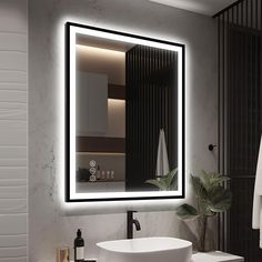 a bathroom with a sink, mirror and towel rack in it's center area