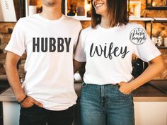 "Hubby Wifey Shirts, Hubby and Wifey Shirts, Hubby Wifey, Couples Shirts, Bride and Groom Shirts, Just Married, Newlyweds, Anniversary, Honeymoon Shirts These adorable couples shirts feature \"Hubby\" and \"Wifey\" on the fronts. It's the perfect gift idea for a bride and groom,newlywed couple, or even those who've been married for YEARS! This listing is for one \"Hubby/Wifey\" shirt SET (BOTH SHIRTS) in Unisex Tees from Bella+Canvas. 50% polyester, 25% combed and ringspun cotton, 25% rayon Avai Engaged Shirts, Matching Couple Shirts, Wedding Shirts, Matching Tees