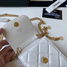 Description CC Phone Holder White Bag For Women 15cm/6in Rep 1:1 Size: 15 × 10 × 4 cm / 6 × 4 × 1.5in CC Sighnature Gold hardware White Includes dust bag. This product is of the best quality. Chanel Phone Holder, Louis Vuitton Shirt, Chanel Shirt, Gucci Gg Marmont, Stylish Handbags, Evening Clutch Bag, Accessories Store, Bag For Women, Chanel Handbags