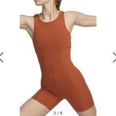 Brand New, Never Worn, Without Tags Originally From Nordstrom For $115 And Since Sold Out. Nike Dri-Fit Yoga Romper Size Women's Medium Burnt Orange/ Rust Color Knotted Strappy Design On The Back Ribbed Detail On Sides Bundle And Save! Approximate Flat Lay Measurements (Unstretched) 12" Bust 11.5" Waist 5" Inseam 30" Total Length Brown Fitted Sleeveless Activewear, Fitted Sleeveless Orange Activewear, Orange Fitted Summer Activewear, Vintage Romper, Fitted Jumpsuit, Cotton Romper, Sleeveless Rompers, Sleeveless Jumpsuits, Black Romper