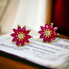 🌺 Fuchsia Flower Crystal Stud Earrings *  Bold Floral Design *  Radiant Statement Jewellery  Brighten up your look with these stunning fuchsia flower crystal stud earrings. Each earring features vivid fuchsia petals arranged in a floral pattern, highlighted by a brilliant central crystal that adds a touch of sparkle. Set in a gold-tone frame, these earrings offer a bold yet elegant aesthetic, perfect for those who love making a statement with their accessories. ✨ Key Features: *Size: Approximat Red Flower Earrings For Formal Occasions, Elegant Red Flower Earrings For Festive Occasions, Red Drop Flower Earrings For Festive Occasions, Red Earrings For Valentine's Day Celebration, Red Flower Earrings For Anniversary, Red Flower Shaped Jewelry For Formal Occasions, Pink Flower Earrings For Anniversary, Elegant Red Flower Earrings For Anniversary, Red Flower Drop Earrings For Wedding