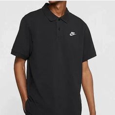 Nwt Nike Sportswear Men's Short Sleeve Pique Polo Shirt. Black And White Coloring. Size Medium. The Nike Sportswear Men's Polo Features Pure Cotton Fabric In A Classic Profile For Lasting Comfort And A Polished Look. Benefits Pure Cotton Fabric Feels Soft And Comfortable Vented Hem Allows Natural Range Of Motion Rib Collar And Cuffs Enhance Durability Fold-Over Collar With Button Placket Product Details Fabric: 100% Cotton Sporty Solid Color Crew Neck Polo Shirt, Nike Short Sleeve Polo Shirt For Sports, Classic Black Polo Shirt For Streetwear, Nike Collared Sports Tops, Black Cotton Sporty Polo Shirt, Sporty Black Cotton Polo Shirt, Black Polo Collar Sports Top, Sporty Collared Polo Shirt For Streetwear, Nike Sporty Short Sleeve Polo Shirt