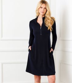 This jet-set ready dress is ideal for when you are on the go with its comfortable travel jersey-knit fabric which features wrinkle-free fabric as a feature. It features zippers at the sleeve and neckline for a versatile look. Wrinkle resistant Long sleeves with zippers Length: 37 7/8 inches (size M) 92% Polyester, 8% Spandex Made in USA of imported fabric Machine wash separately or dry clean Side pockets Boho Chic Outfits, Travel Dress, Style Upgrade, Karen Kane, Floral Print Skirt, Made Clothing, Bohemian Clothes, Petite Outfits, Classy Women