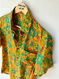 90s Vintage Men's Silk Shirt / Men's Hawaiian Shirt / Silk Shirt / Chic Shirt For Men / Gifts For Him / Shirt For Him / Holidays Shirt JAIPUR CRAFT AND ART Presenting Indian Vintage Silk Shirts For Men And Women . Limited Edition Shirt. Fabric on a limited Prints And Edition, The Men / He will feel so unique! Beautiful Shirt in Silk, Button Up and Short sleeves.   Perfect Gifts For Him / Gifts For Father / Gifts For Boyfriend / Gifts For Brother  Your Men / He will feel amazed by the quality and Multicolor Printed Tops With Spread Collar, Green Printed Shirt With Spread Collar, Green Vintage Print Short Sleeve Top, Yellow Hawaiian Cotton Top, Orange Cotton Top With Camp Collar, Multicolor Spread Collar Tops For Summer, Green Printed Top With Spread Collar, Hawaiian Shirt With Vintage Print In Cotton, Hawaiian Cotton Shirt With Vintage Print