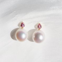 "Rose Peach 14K Yellow Gold Pink Gemstone Pink Sapphire Freshwater Baroque Round Pearl Earrings Pearl Size: 12-13mm Pearl Color: Metallic White Pearl luster: Excellent Pearl Surface: Clean Pearl Quality: AAA Freshwater Pearl  Pearl Shape: Baroque Round Natural Pink Sapphire: 0.40ct Metal: 14k Solid Yellow Gold Ear Wire, not gold-filled or plated Stamp: AU585, KAI The lustrous baroque pearl looks round and juicy like a summer peach. The lovely baby pink of Sapphire is as sweet as a blooming rose. Pink Briolette Fine Jewelry Earrings, Fine Jewelry Pink Briolette Earrings, Elegant Pink Teardrop Pearl Earrings, Pink Briolette Earrings For Wedding, Pink Teardrop Pearl Earrings For Formal Occasions, Classic Pink Pearl Earrings For Wedding, Classic Pink Pearl Wedding Earrings, Classic Pink Earrings For Wedding, Fine Jewelry Pearl Earrings With Pear-shaped Gemstone