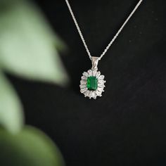 "EMERALD BAGUETTE NECKLACE: A Thoughtful Christmas Gift for Her Are you searching for the perfect Christmas gift that conveys your deep appreciation for your best friend? Look no further! Our \"Emerald Baguette Necklace\" is a heartfelt choice that symbolizes your unique bond. EXQUISITE CRAFTSMANSHIP AND DESIGN Crafted from high-quality 925 sterling silver and adorned with sparkling diamond cz, this necklace is a true standout. The baguette-cut emerald cz, a symbol of love and inspiration, takes center stage in a delicate and minimalist design. PRODUCT DETAILS * Chain Length: 16-18 inches * Chain Style: Cable * Adjustable Length: Yes * Material: 925 Sterling Silver * Gemstone: Diamond cz, baguette-cut emerald cz * Average Weight: 3.9 grams * Dimensions: 0.5 by 0.6 inches * Style: Minimalis Gift Gemstone Necklace With Baguette Cut, Baguette Cut Gemstone Necklace As Gift, Baguette Cut Gemstone Necklace For Gift, Silver Emerald Jewelry With Baguette Diamonds, Fine Jewelry Baguette Diamond Necklace Gift, Gift Fine Jewelry Emerald Necklace With Baguette Diamonds, Baguette Cut Emerald Necklace Gift, Classic Necklace With Baguette Diamonds For Gifts, Emerald Cut Baguette Diamond Necklaces For Gifts