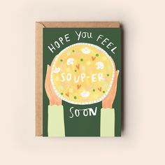 a card that says hope you feel souper son with two hands holding a bowl