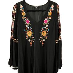 Black, Floral Embroidery, V-Neck, Lined, Bell Sleeves. Hand Wash. Condition: Like New (Possibly Never Worn? Can’t Remember) Multicolor Embroidered V-neck Dress With Floral Print, Spring Festival V-neck Embroidered Dress, Bohemian Black Embroidered Dress For Spring, Fall Embroidered Hem V-neck Dress, Fall V-neck Embroidered Hem Dress, V-neck Embroidered Dress For Spring Festival, Black Bohemian Dress With Embroidered Sleeves, Multicolor Embroidered V-neck Dress For Festivals, V-neck Embroidered Dress For Festival With Multicolor Embroidery